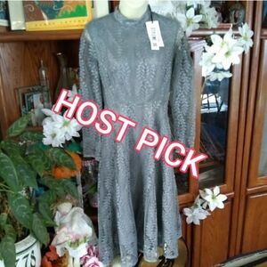 NEXIIA ELEGANT LONG SLEEVE PIERCED MIDI DRESS